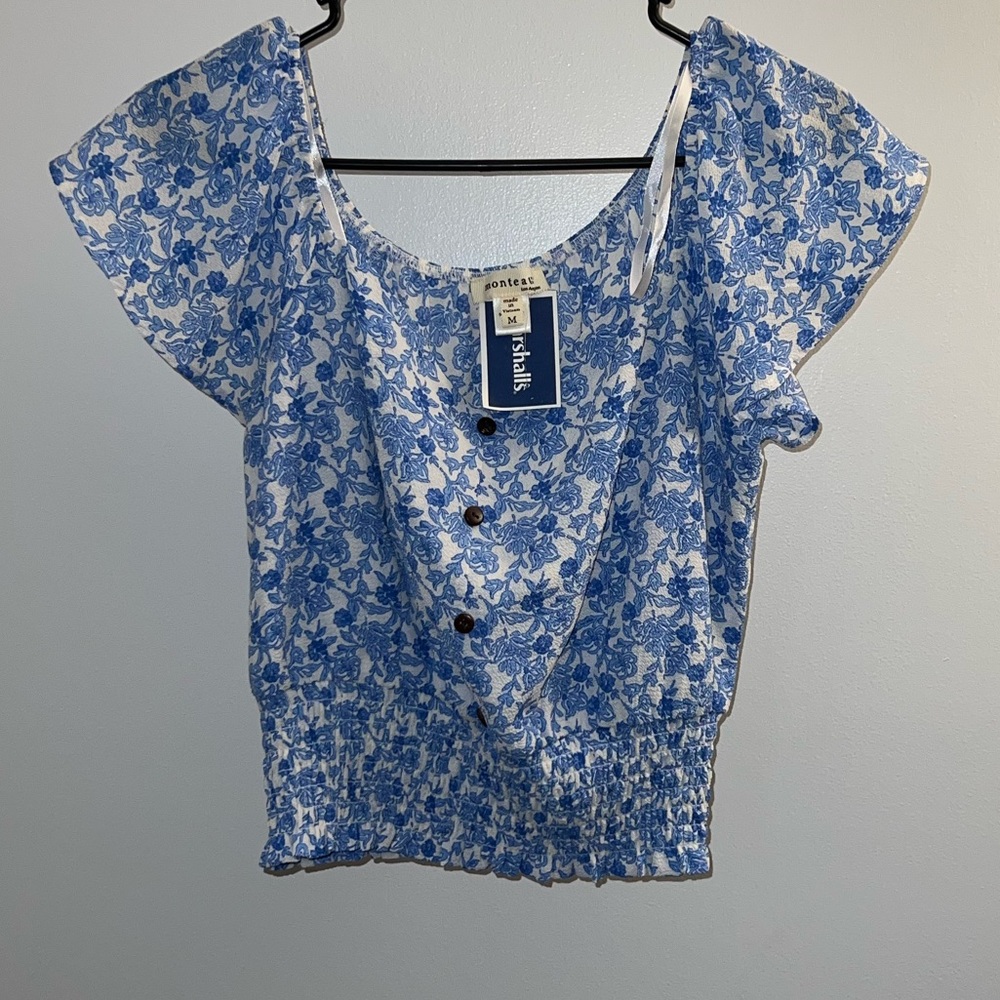Brand new shirt from Marshall’s. Blue flowers and buttons on it